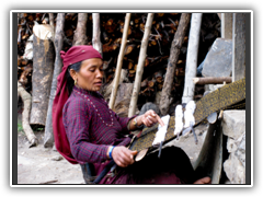 Nepali woman weaving a scarf
